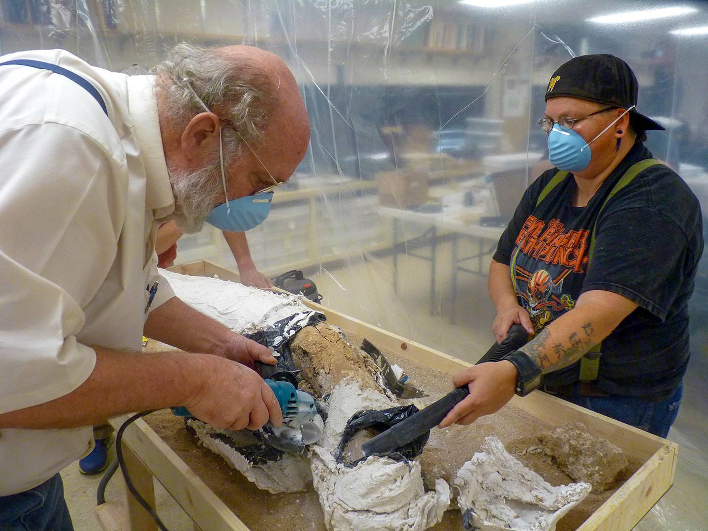 WSU student and professor work to excavate a mammoth tusk discovered in Cunningham, Kansas