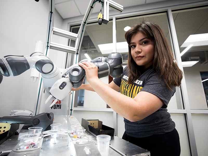 Students get hands-on experience working in WSU's Robotics and Automation Lab.
