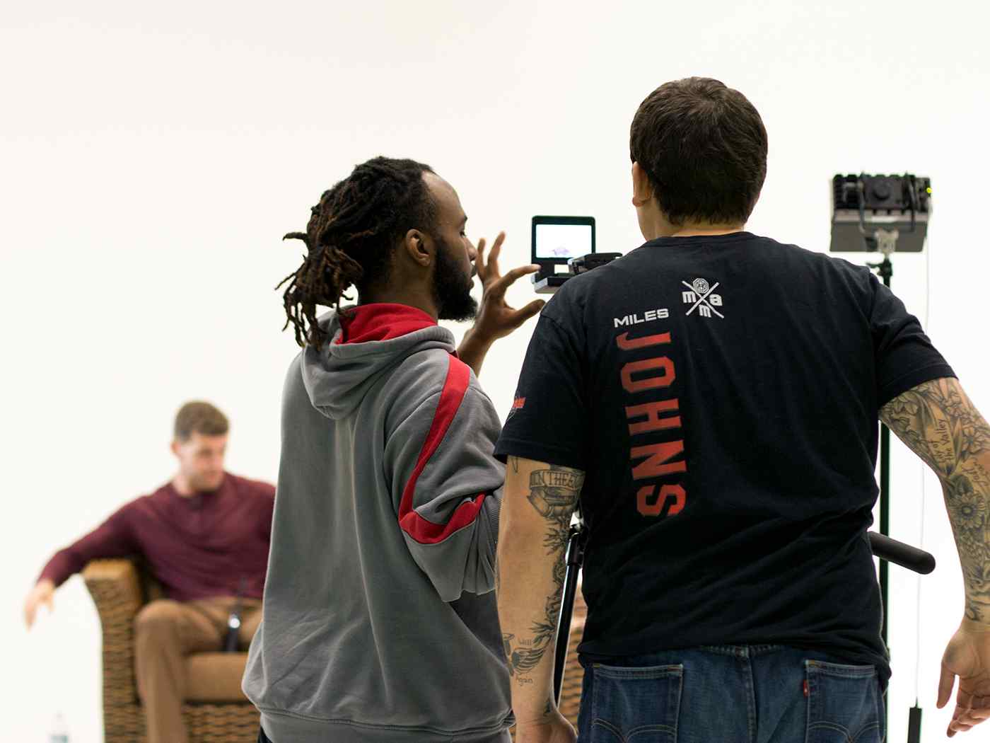 Two male students recording a film.