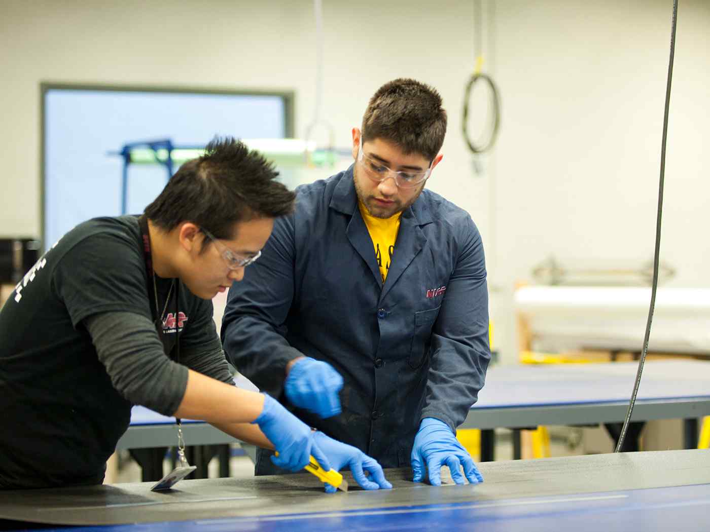 Engineering Graduate students working in NIAR lab.