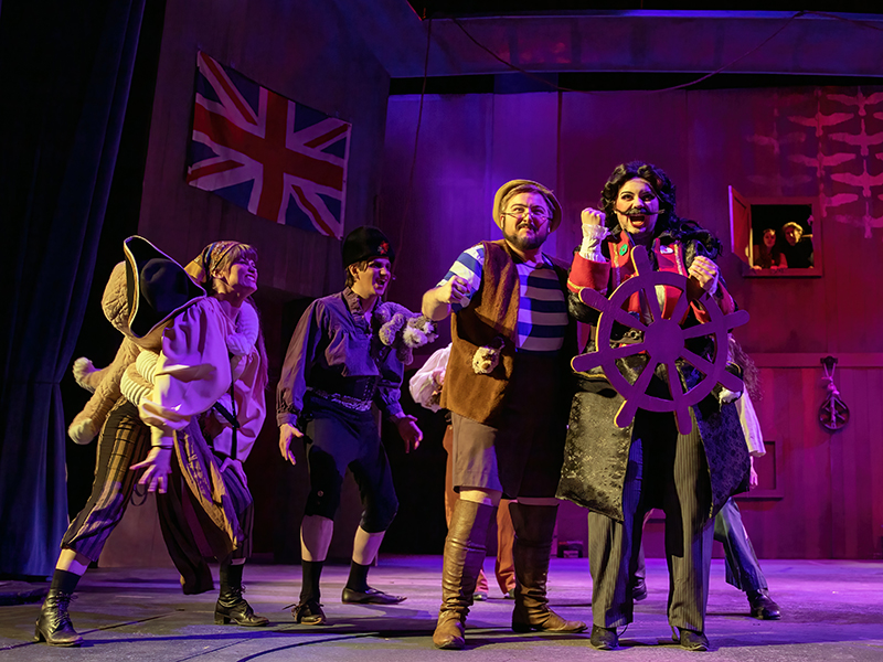 Students performing on stage.