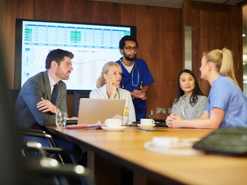 Health Science Main Image health professionals working together at a table