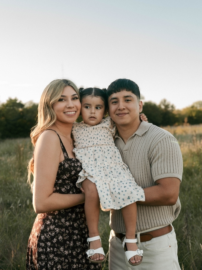 Adrianna Anderson Alicia is pictured hugging her child and significant other.