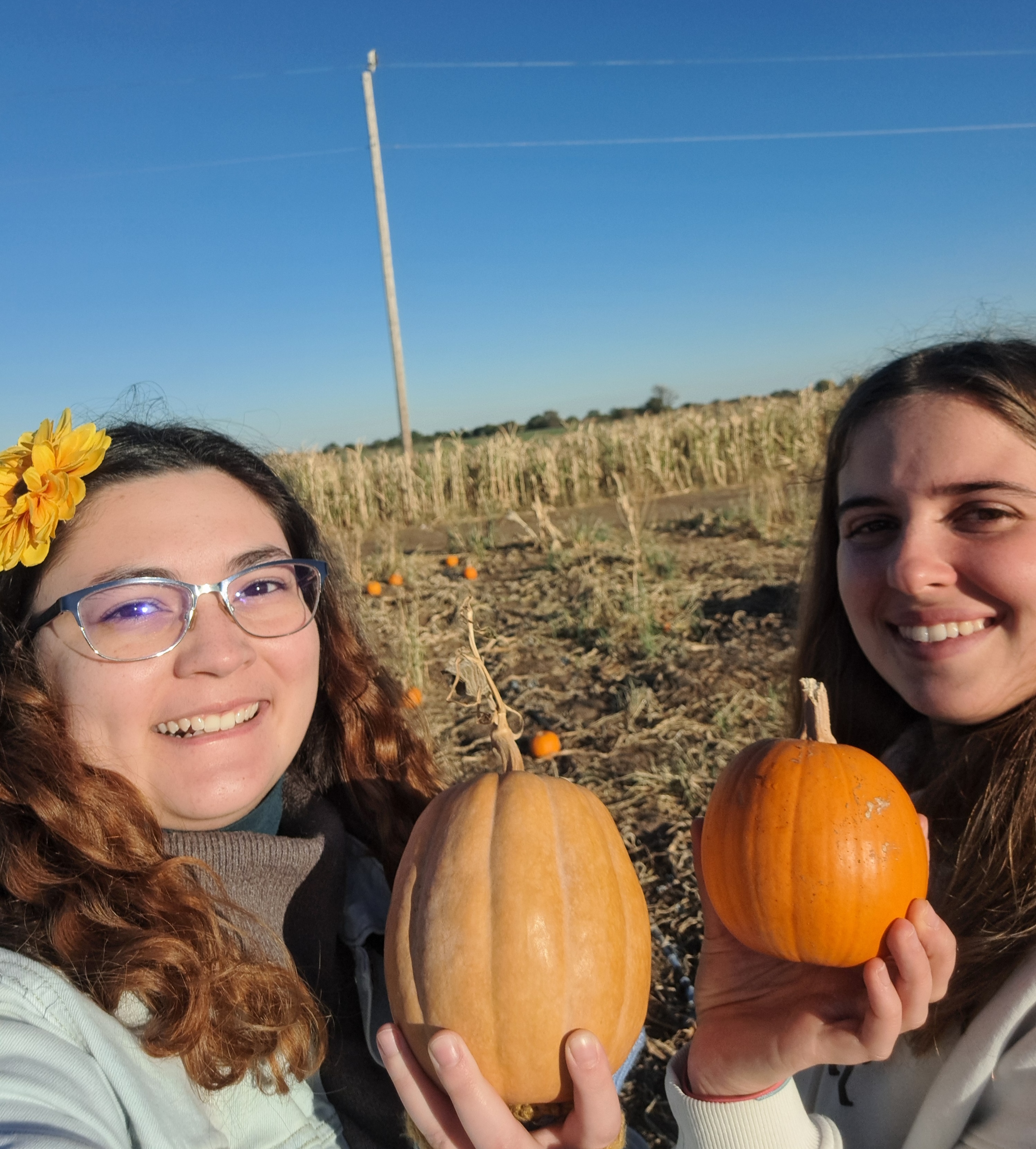 Phebe with buddy at pumpkin patch