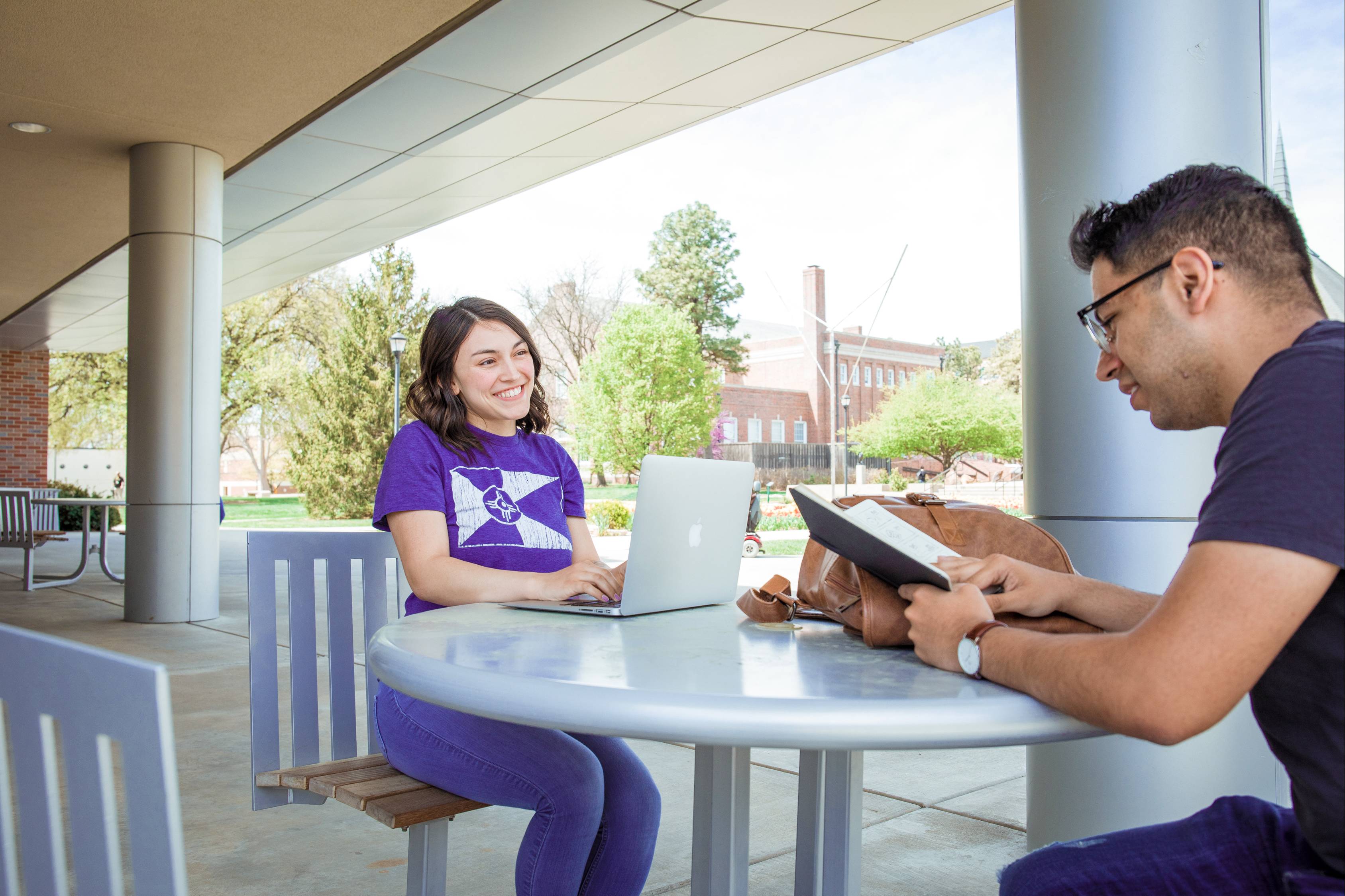 Students studying outside the Rhatigan Student Center