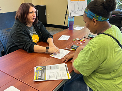financial aid staff standing in RSC