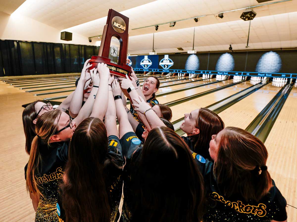 The Shocker women's bowling team celebrates after winning the NCAA Regional to advance to the Final Four