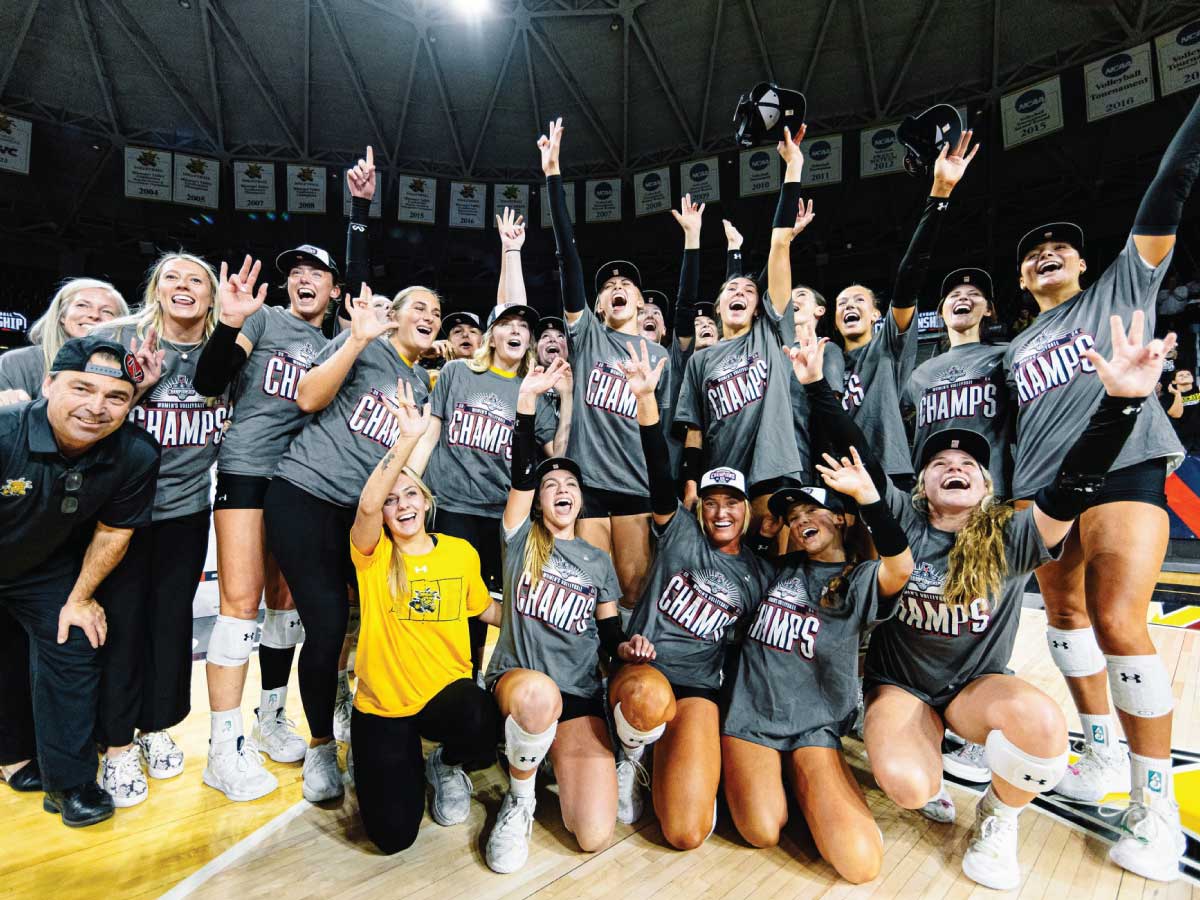 Shocker volleyball celebrates after winning the AAC Championship