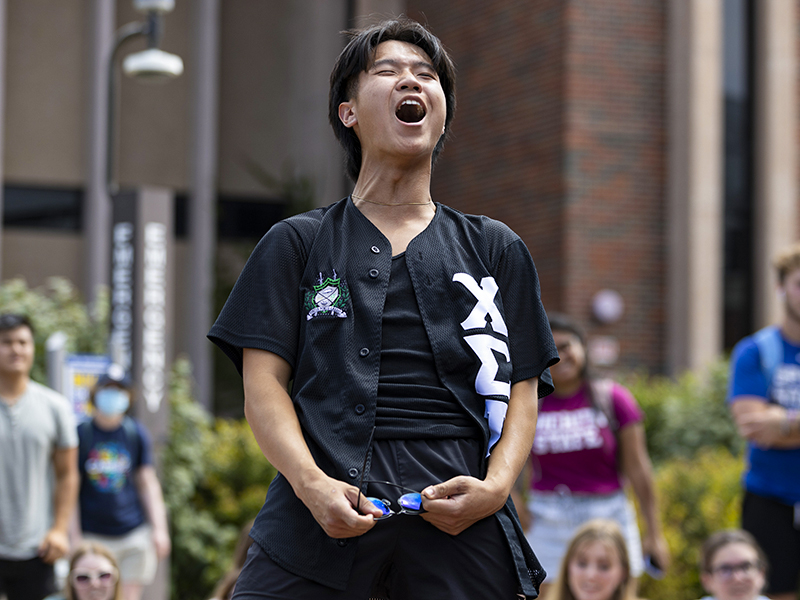 A student participates in the annual Multicultural Greek Council Yard Show.