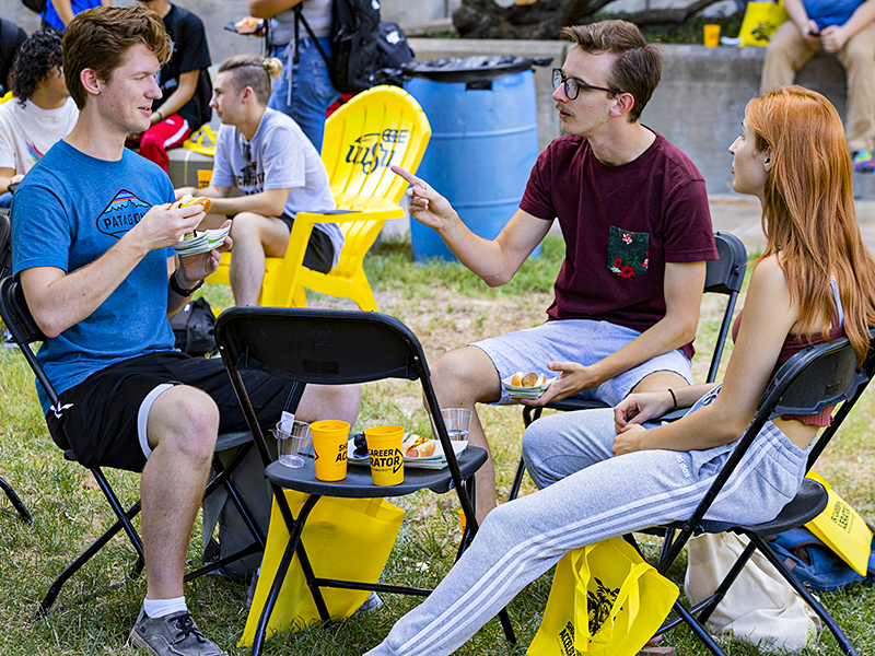 Students enjoy food and conversation at the 2022 Shocker Career Accelerator Root Beer Kegger.