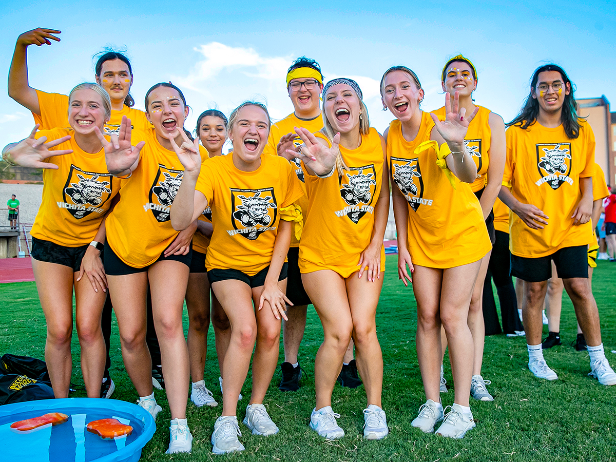 Chloe Strecker celebrates with her fellow College of Liberal Arts and Sciences (LAS) teammates during the 2024 Clash of Colleges.