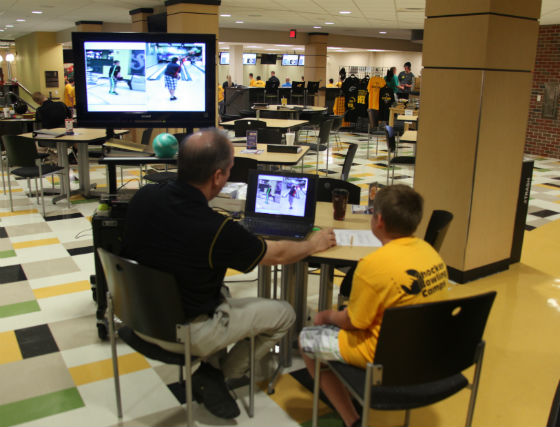 Take-home DVD video analysis with Coach Lewis