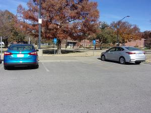 Photo of ADA parking by Duerksen south of building.