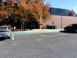 PHoto of ADA parking at Devlin Hall just East of Cessna Stadium.