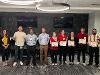 The team members of MedX Innovations hold their certificates and pose with the Finals Judges.