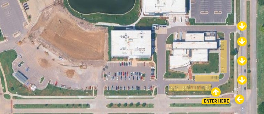 Aerial view of AVET with arrows showing how to access the building from the main street and where to park