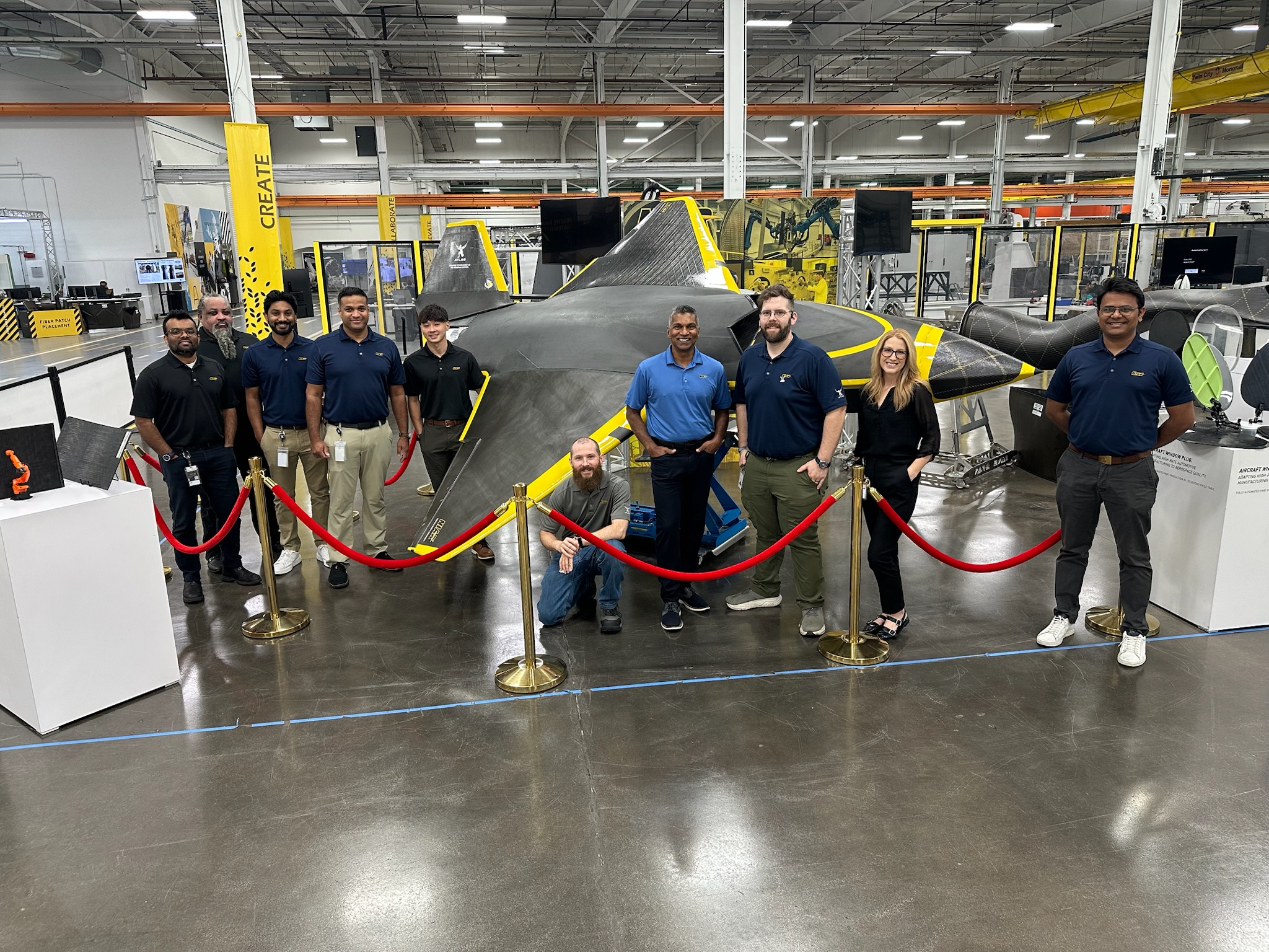 Representatives from NIAR’s Advanced Technologies Lab for Aerospace Systems posing for a picture promoting The Composites and Advanced Materials Expo in Atlanta on Sept. 21-24. From left to right: Nalin Waas, Tim Donnell, Varun Sarja, Jerome Teoh, Ethan McDaniel, Waruna Seneviratne, Josh Goertz, Kristen Leal, Ravi Patel
