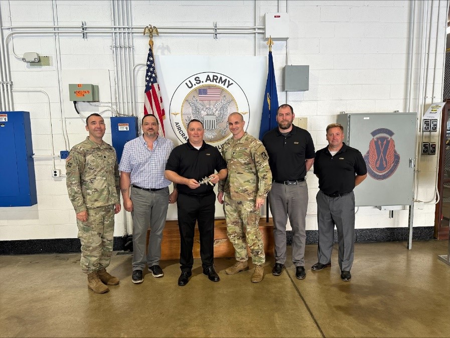 NIAR team delivers part to Army team at Fort Eustis