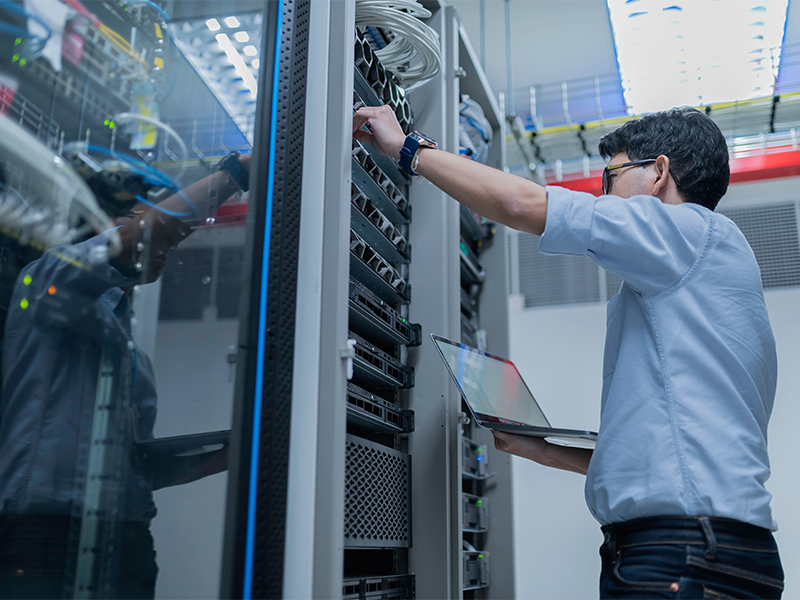 Photo of someone working on a server