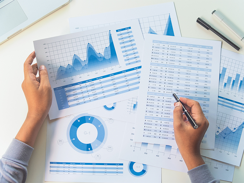 Photo of someone analyzing data