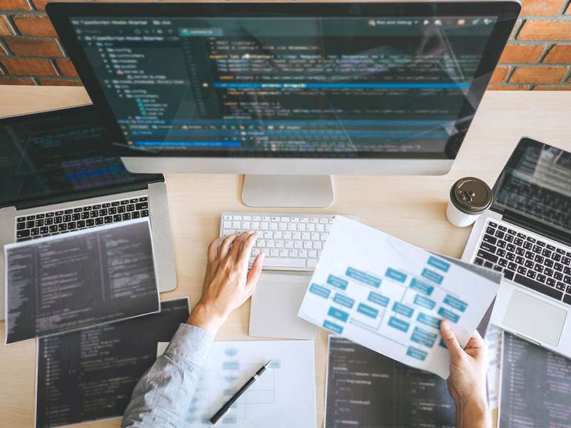 Photo of a person testing code