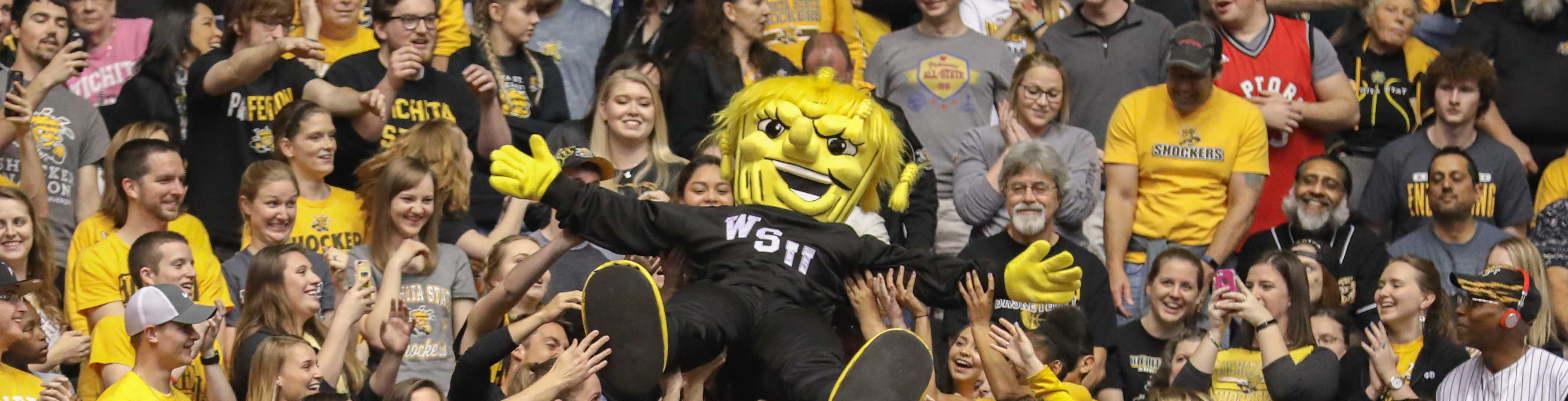 wushock crowdsurfing at a basketball game