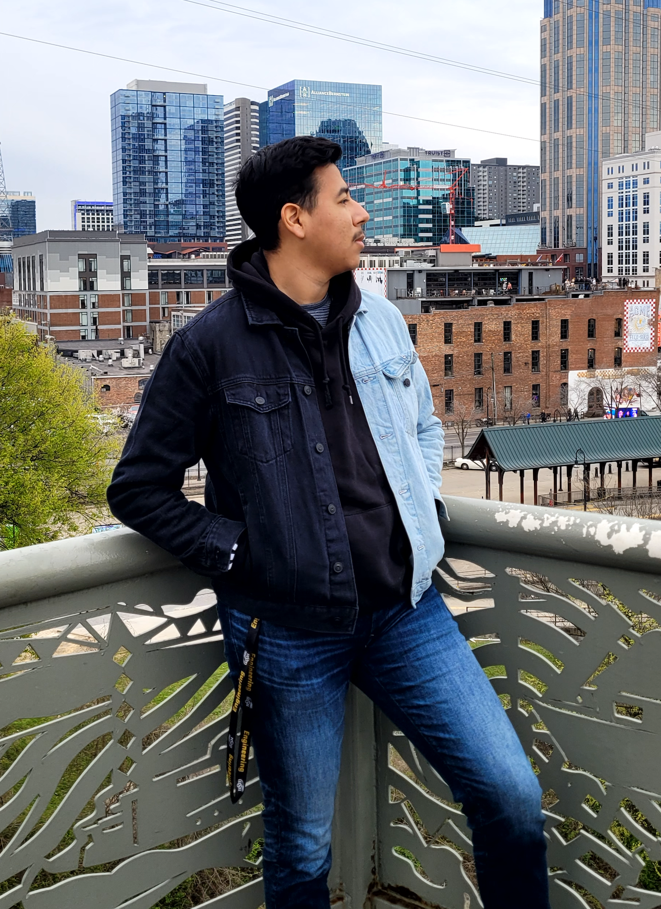 Photo of Josue Renteria in front of city skyline