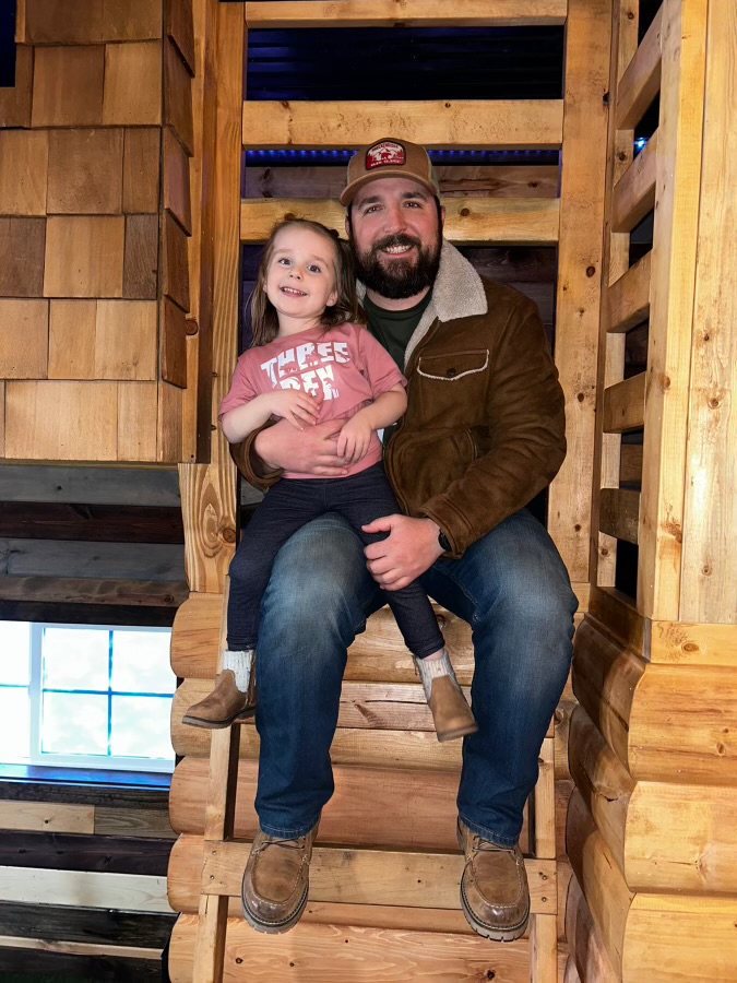 Photo of Christoper Schmidt with his daughter