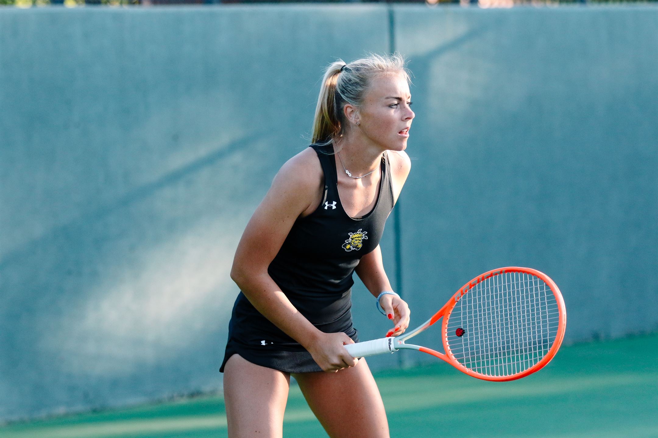 Harriet Hamilton playing tennis
