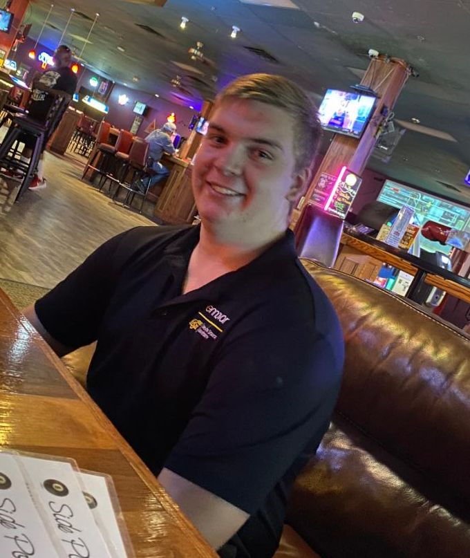 Photo of Avry Voyles at a restaurant