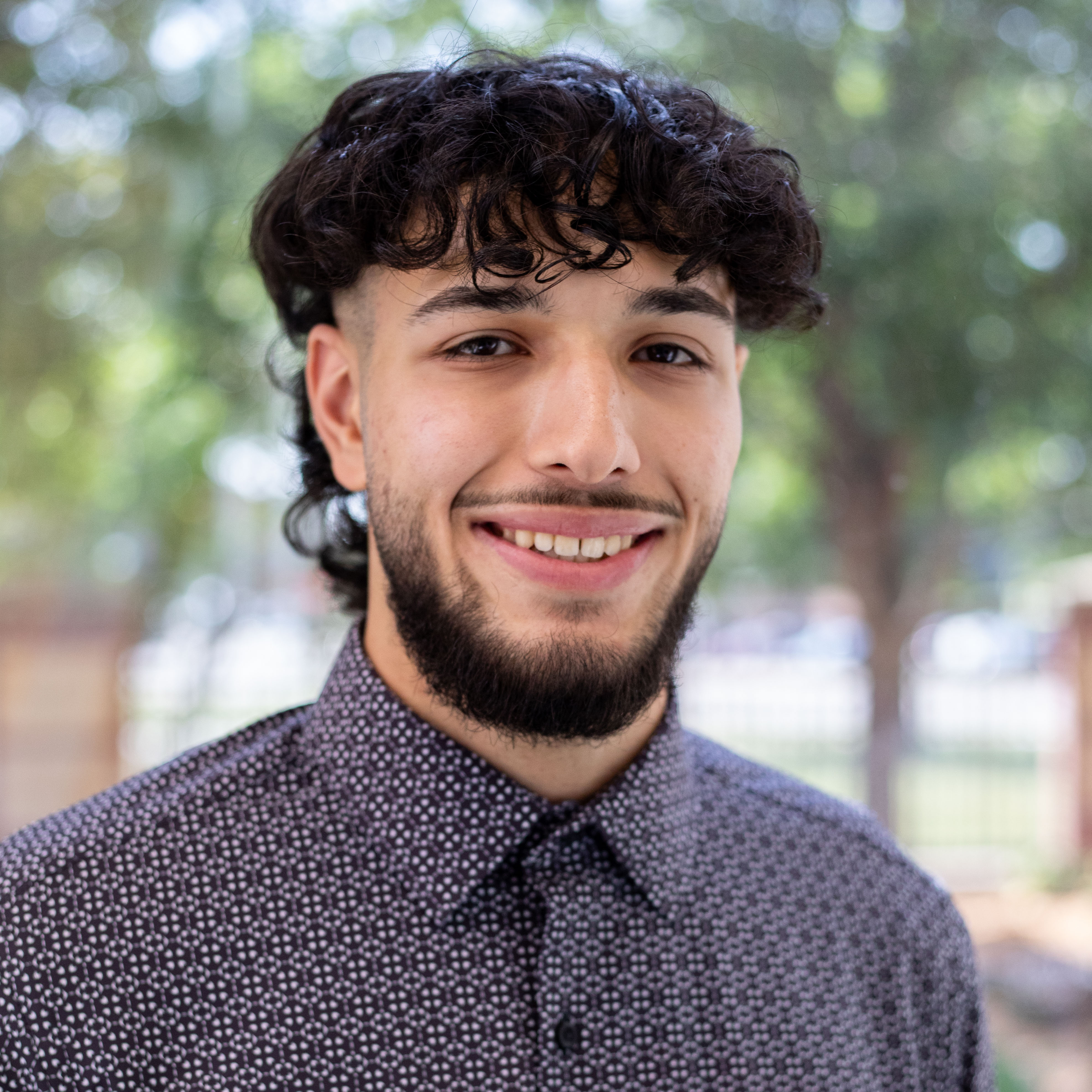 Photo of Zach Walden and one other