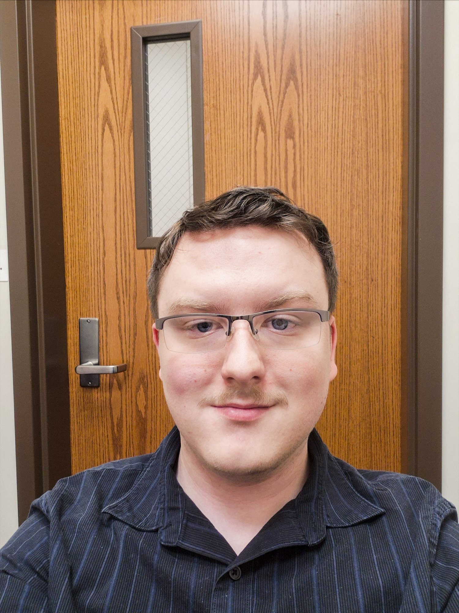 Headshot photo of James Wood