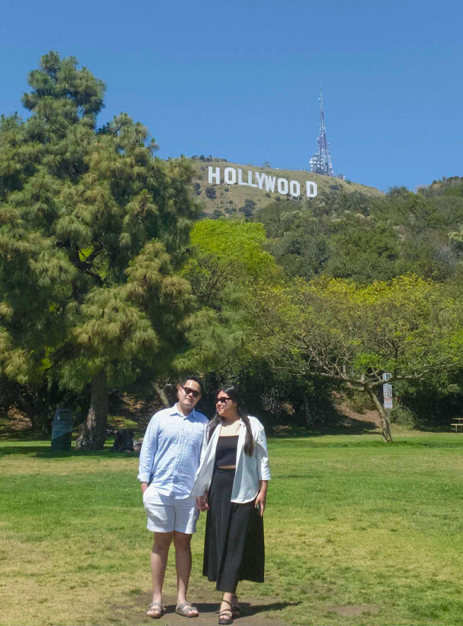 Photo of King Nguyen and one other in a park near the Hollywood sign