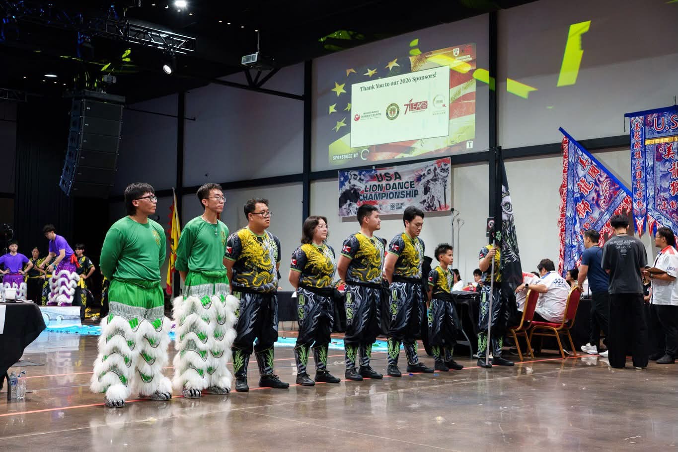 Photo of Jennifer Dang lined up with other member of the All Saints Dragon and Lion Dance Team at the 2026 USA Lion Dance National Championships.