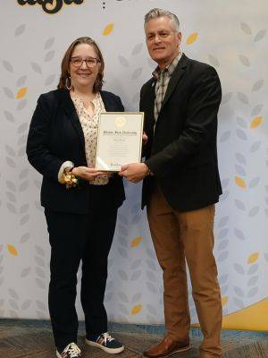 Robin Henry with President Muma