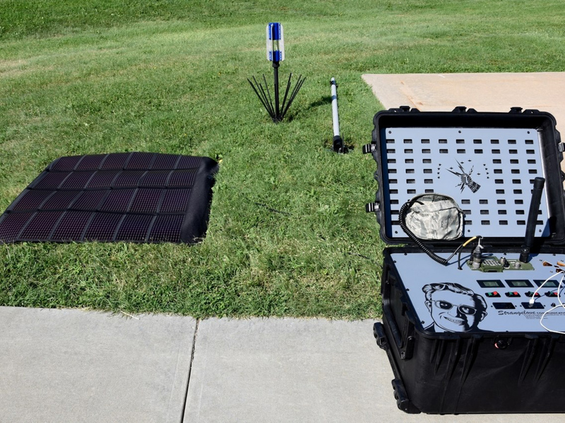 radio equipment and solar panel on grass radio equipment and solar panel on grass