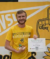 Jared Gulledge with the dumpster fire award