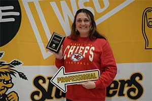 Katie Davidson accepting an award.