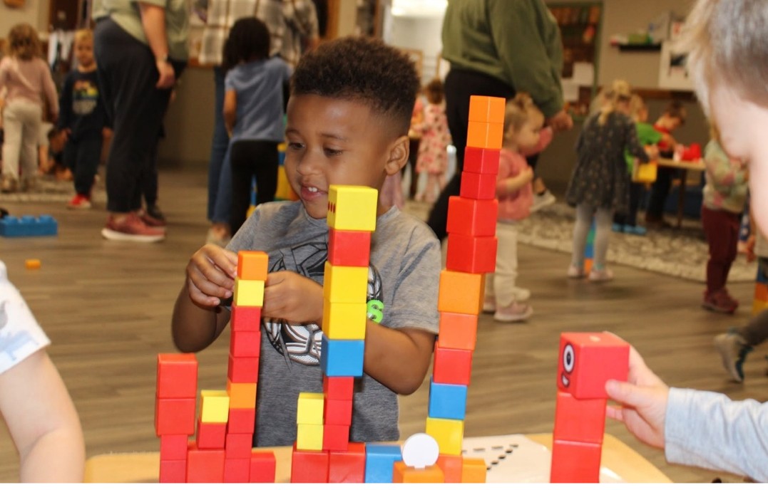 child playing with blocks