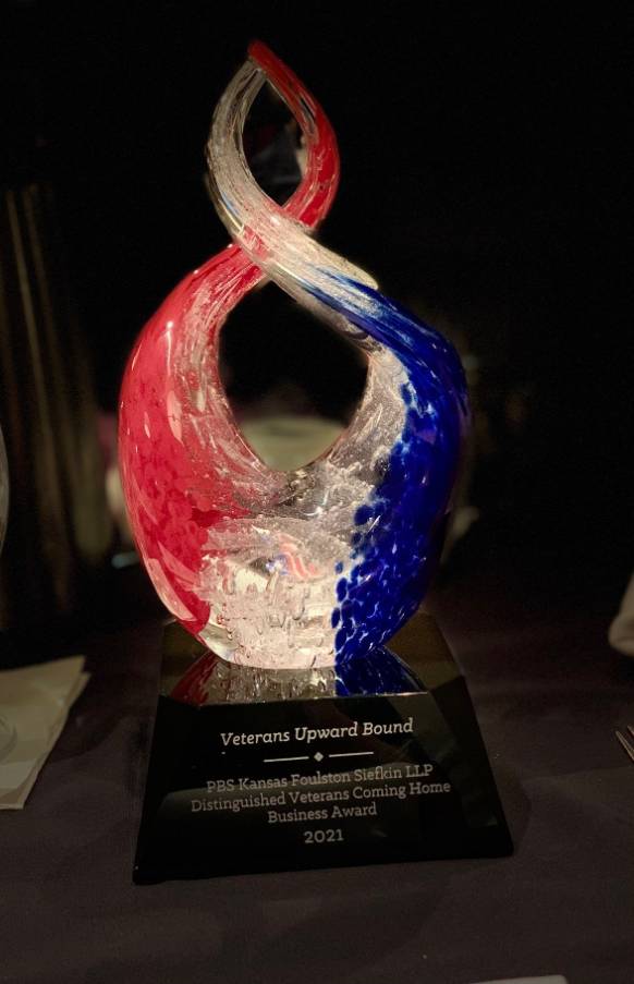 Glass red, white, and blue award trophy for Veterans Upward Bound