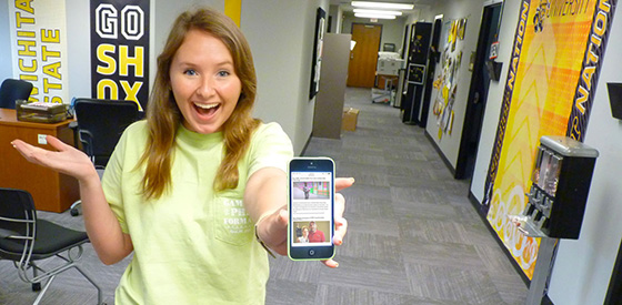WSU student showing off webmail access via her mobile device.