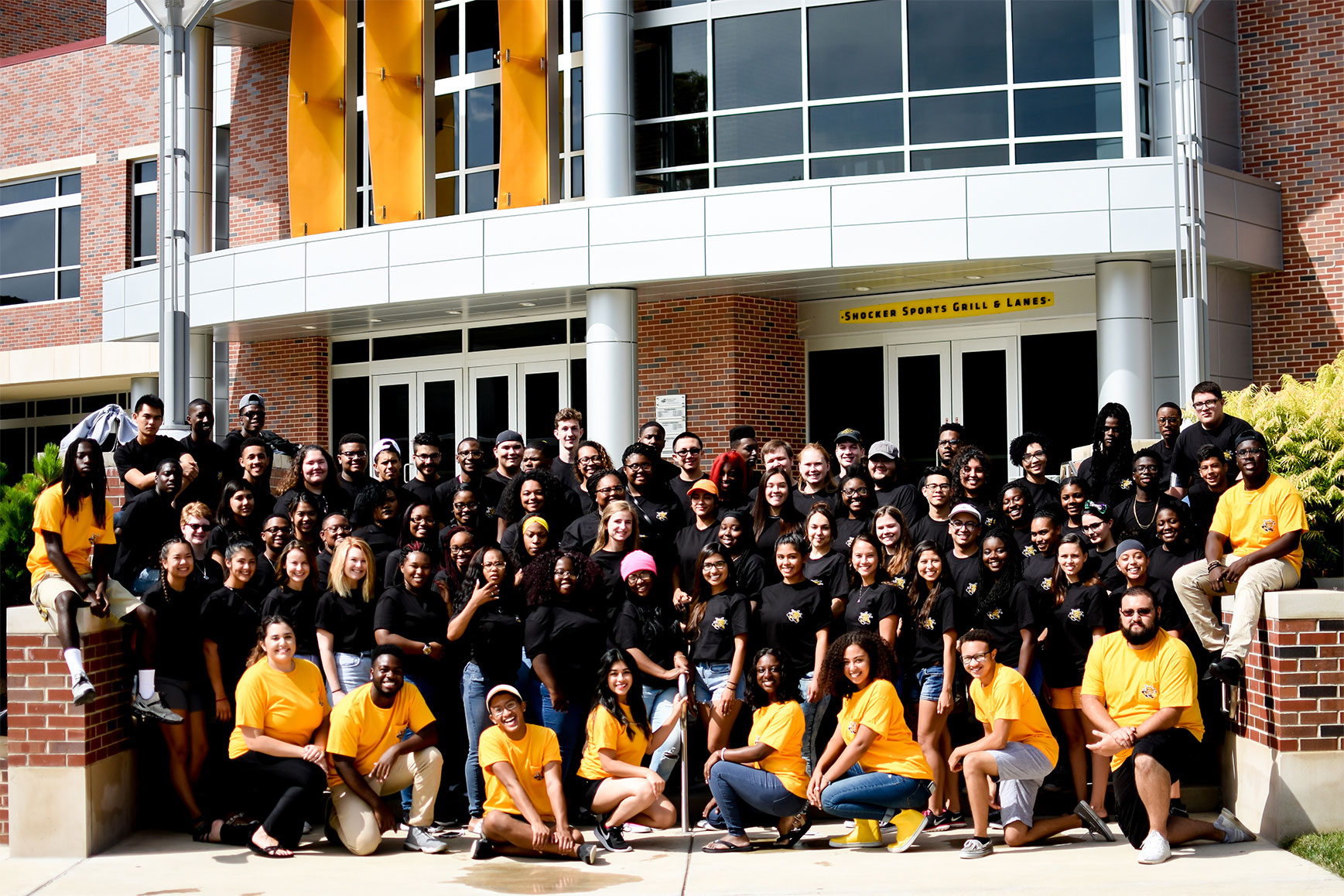 A group of students taking a picture together in front of RSC.