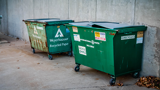 Recycling bins outside at the Devlin Hall dock