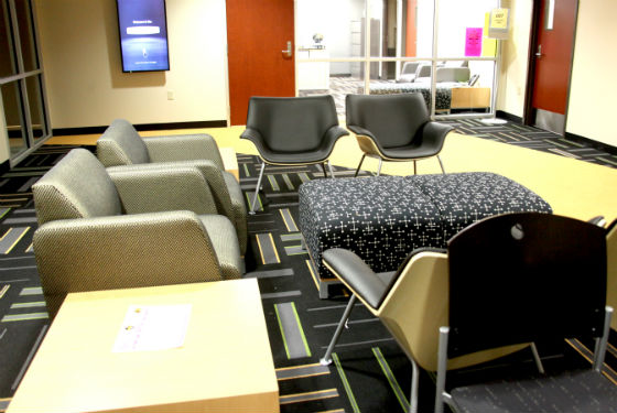 Photo of a seating area in the Striker's Lounge. 