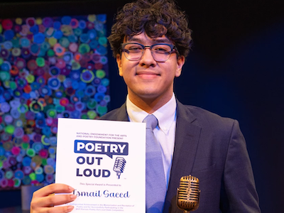 Ismail Saeed Ismail Saeed is holding a poetry award