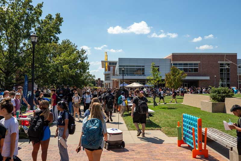 Picture of the RSC with students walking to class