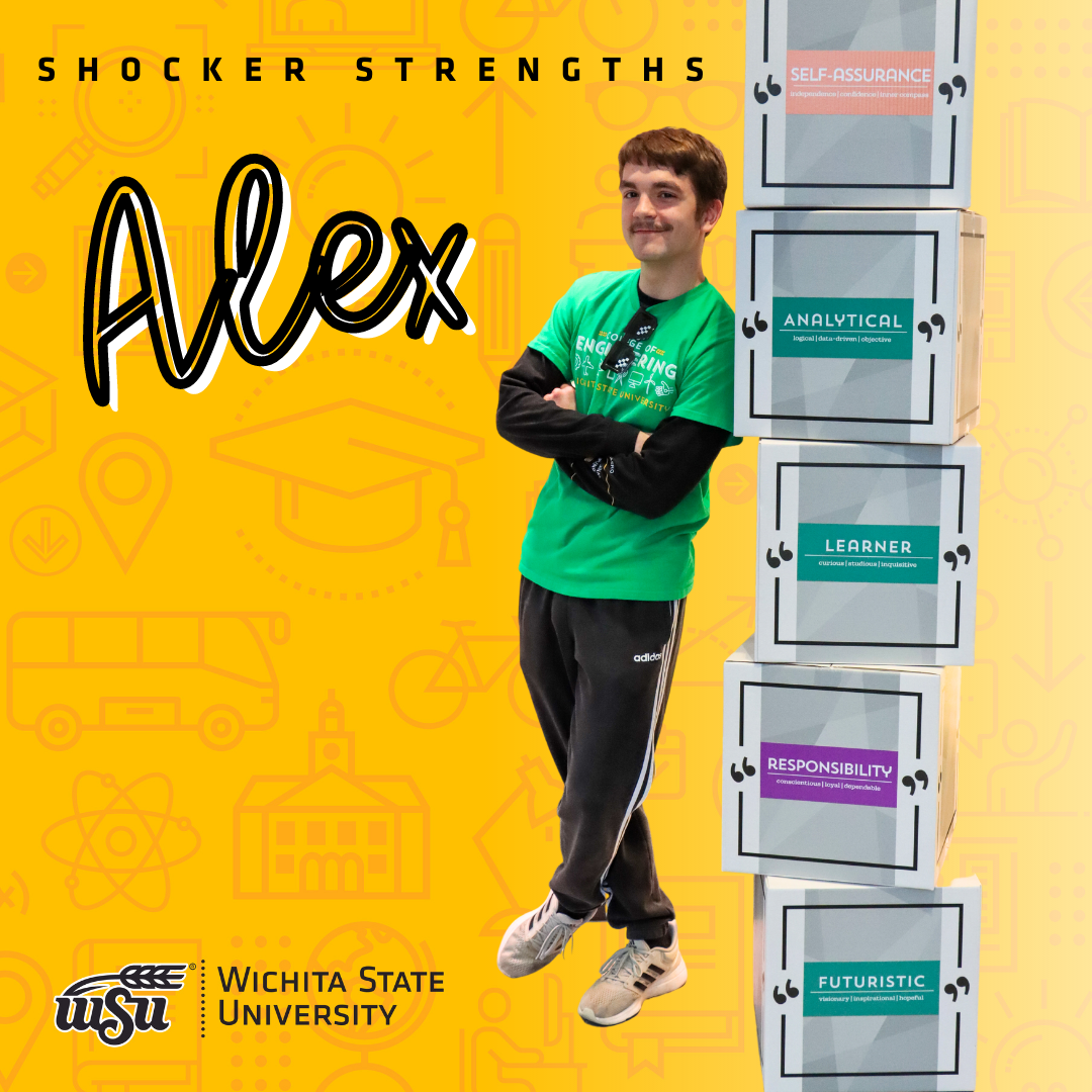 boy standing next to strengths boxes