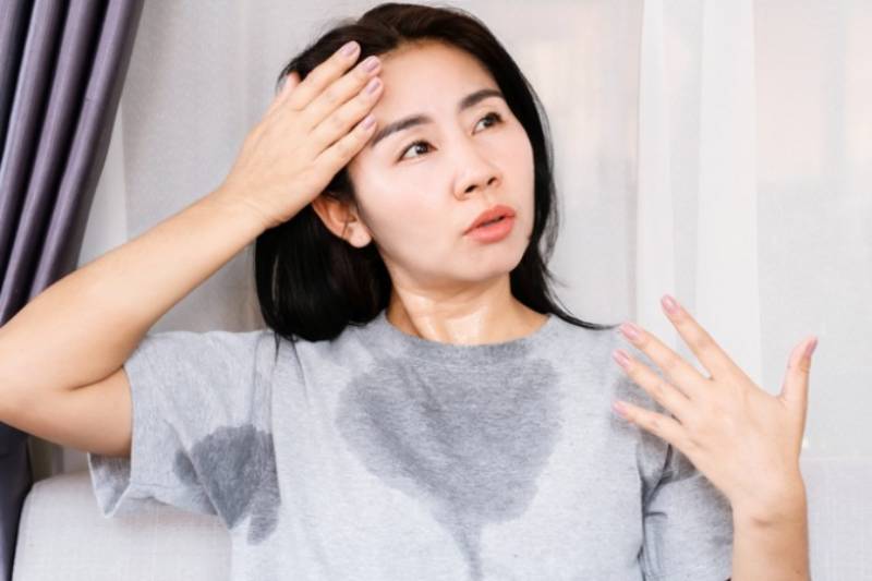 Woman sweating