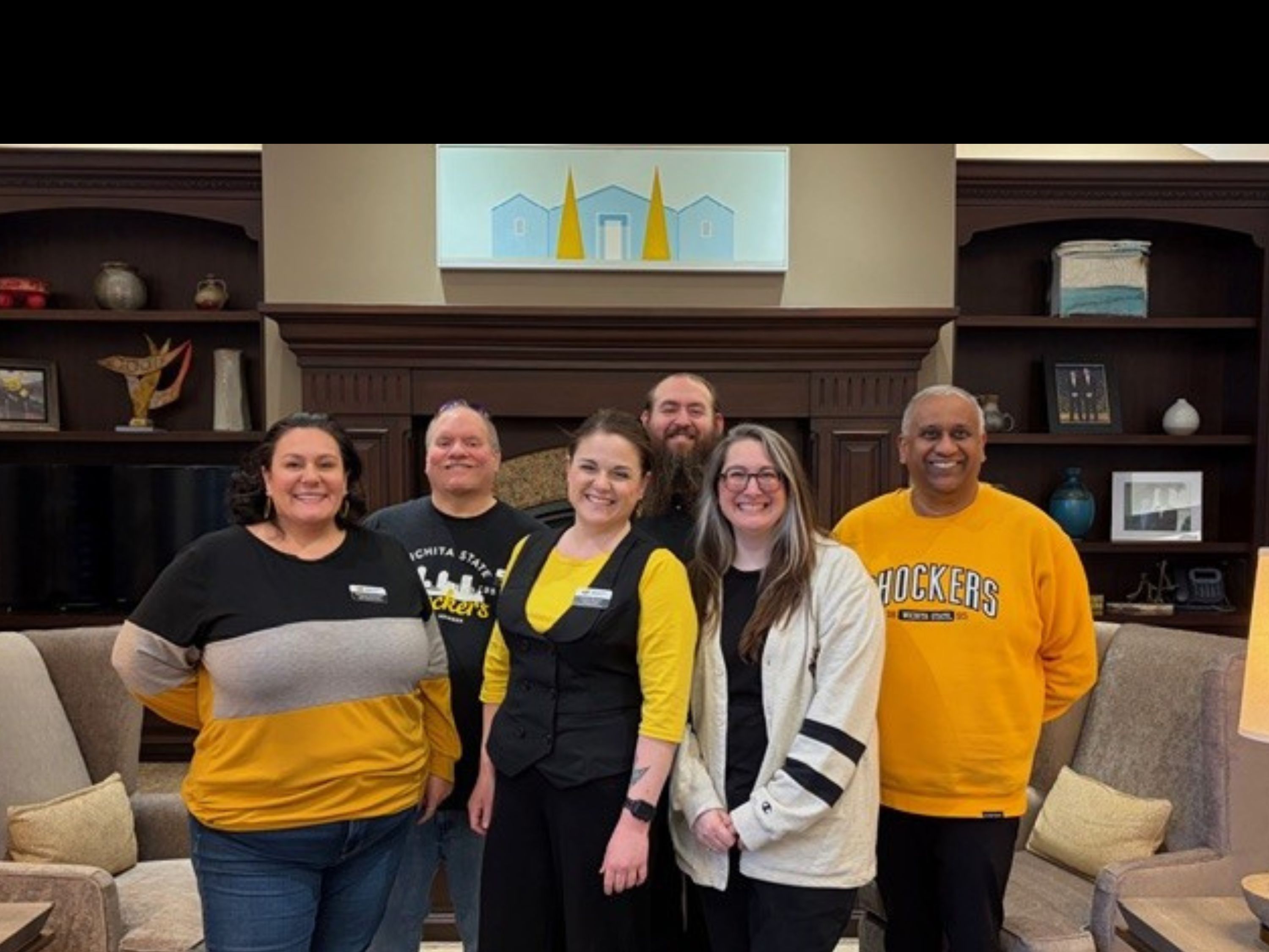 coaches standing together in president's residence.