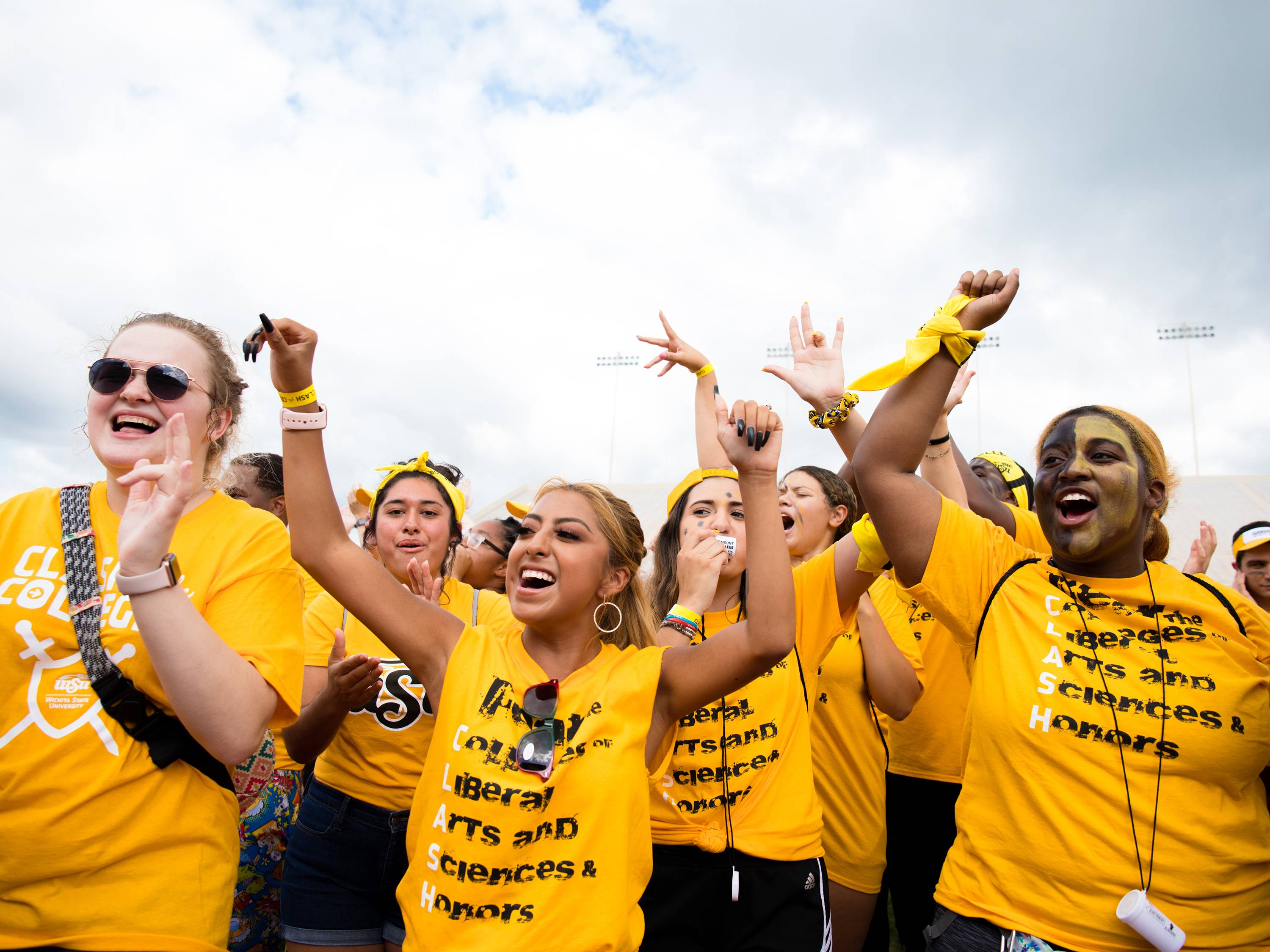 Liberal Arts and Sciences students cheer in the crowd at Clash of the Colleges
